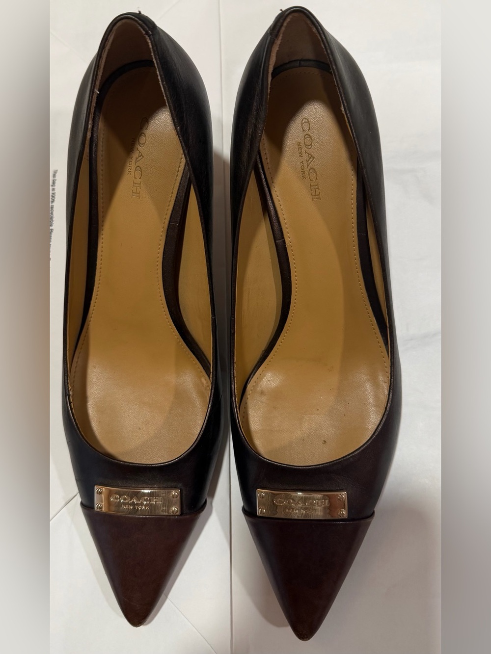 Coach Women's Dark Brown Leather Pointed Toe Pumps with Gold Plaque